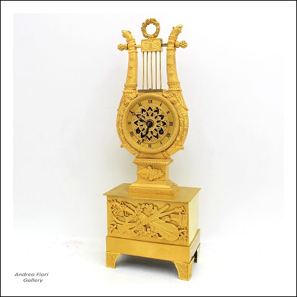 Antico Orologio a Pendolo \"Lira\" Impero in bronzo dorato XIX secolo